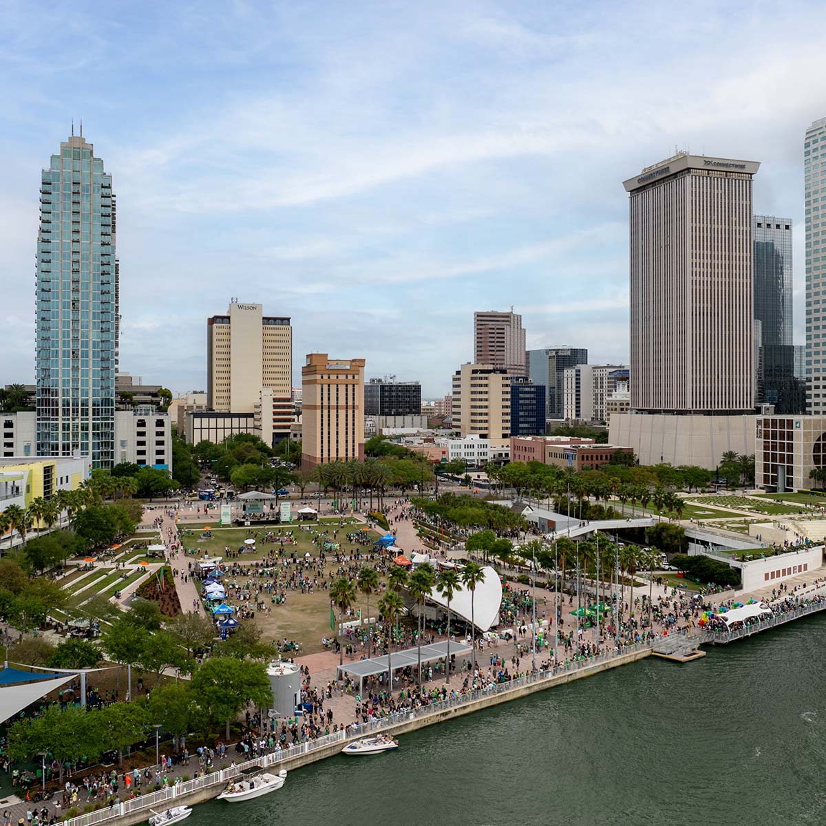 Aerial view of Curtis Hixon Waterfront Park in Tampa bustling with people.